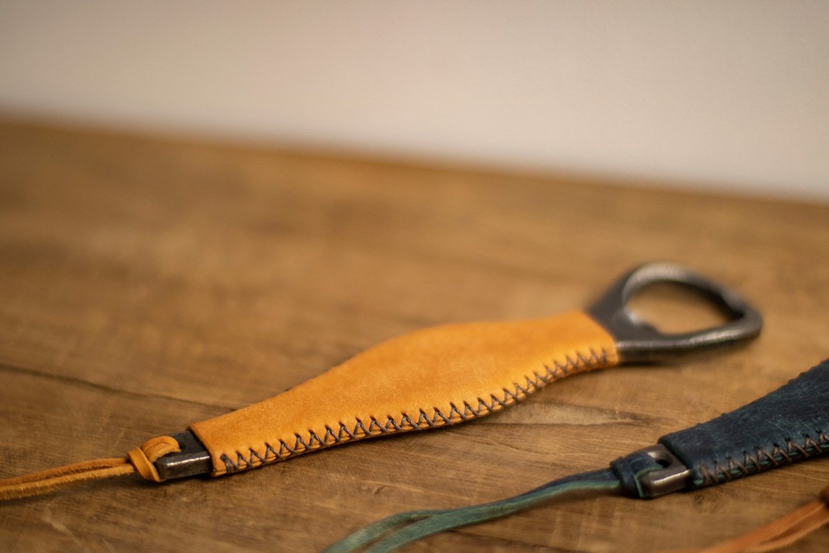 Bottle opener with colorful hand-stitched leather handle - Image 2