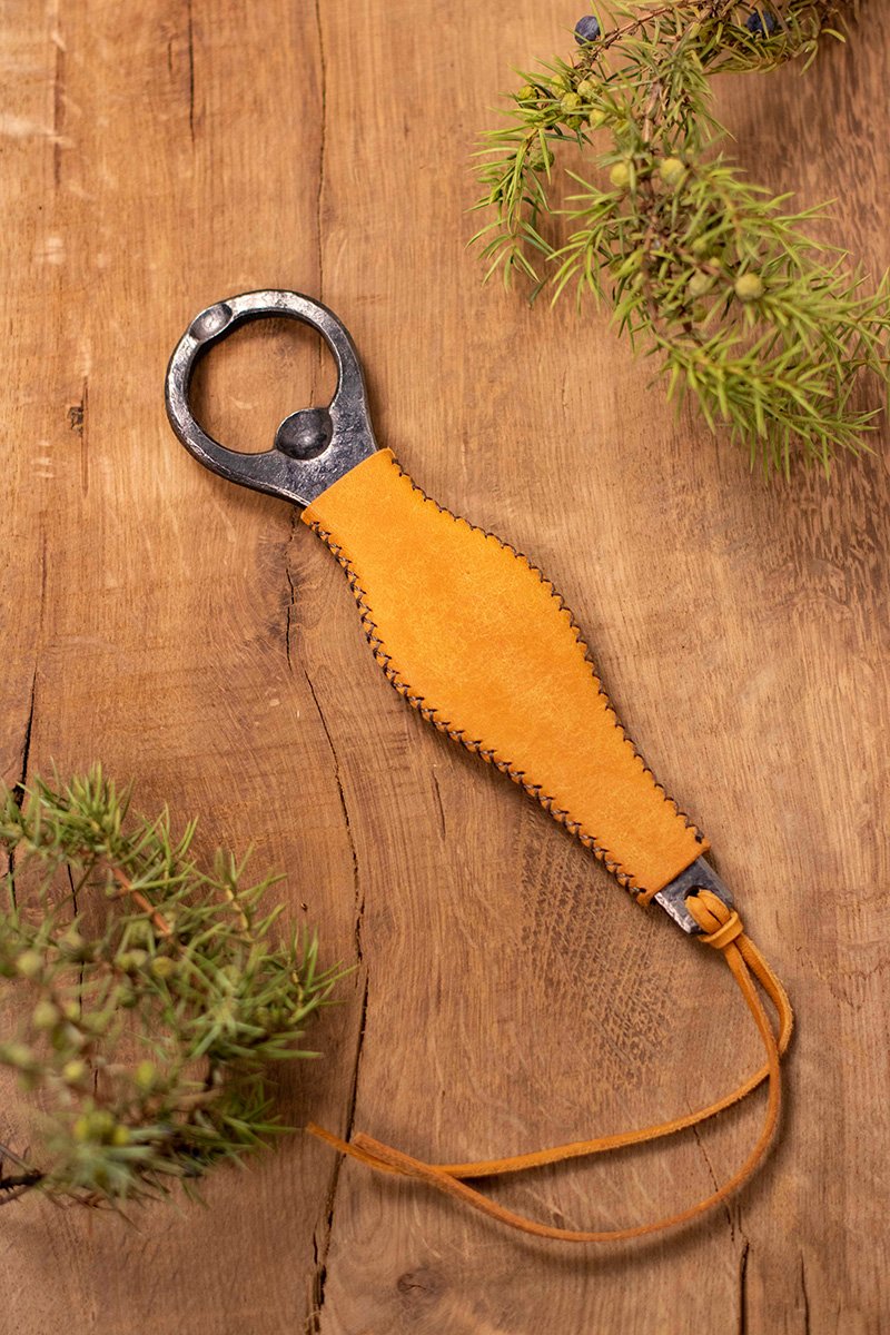 Bottle opener with colorful hand-stitched leather handle - Image 11
